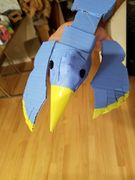 Cardboard and paper painted bird puppet